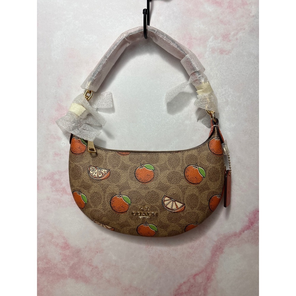 NWT Coach Mini Payton Bag in Signature Canvas with Orange Print - Style CBA78